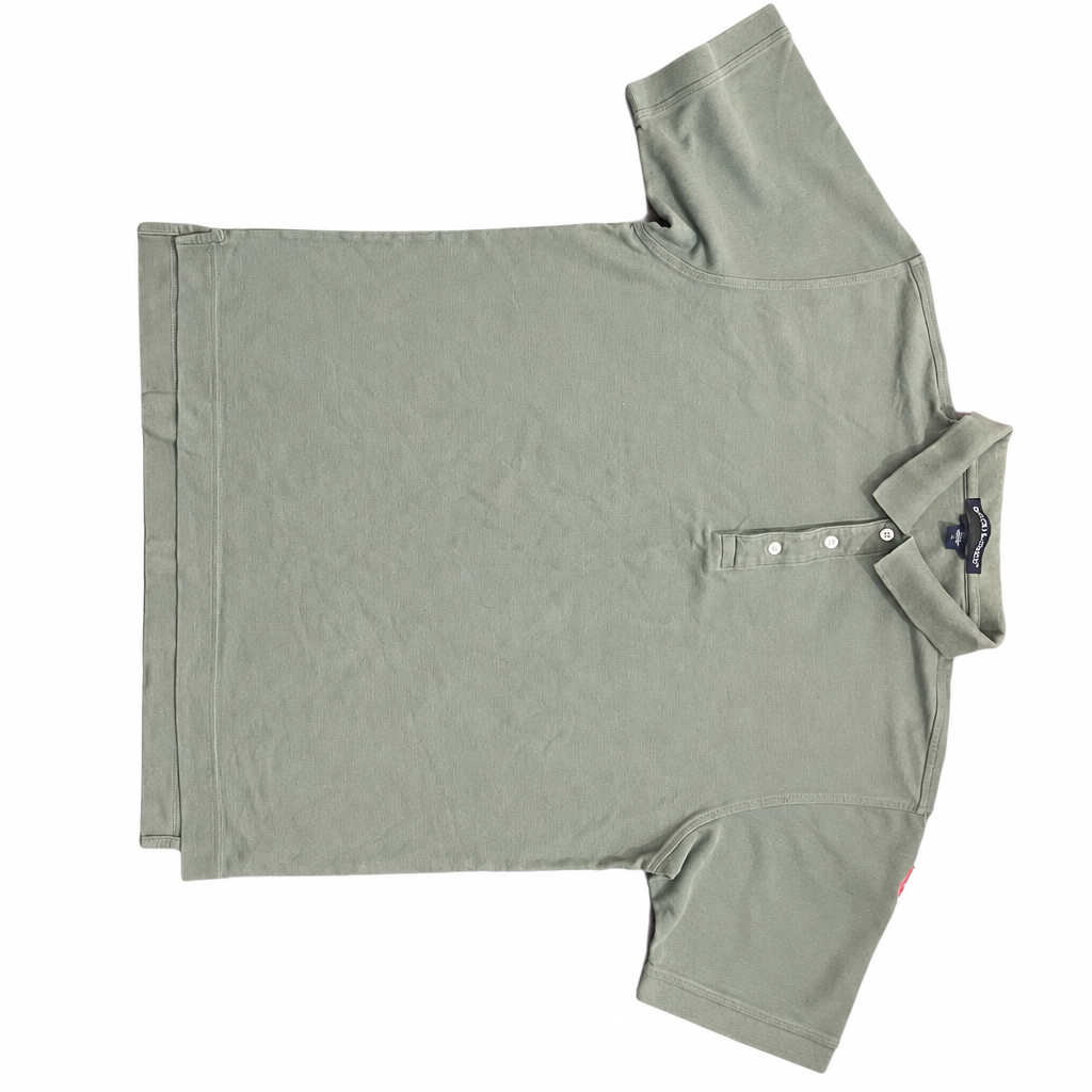 Devon & Jones sage green polo shirt on white background